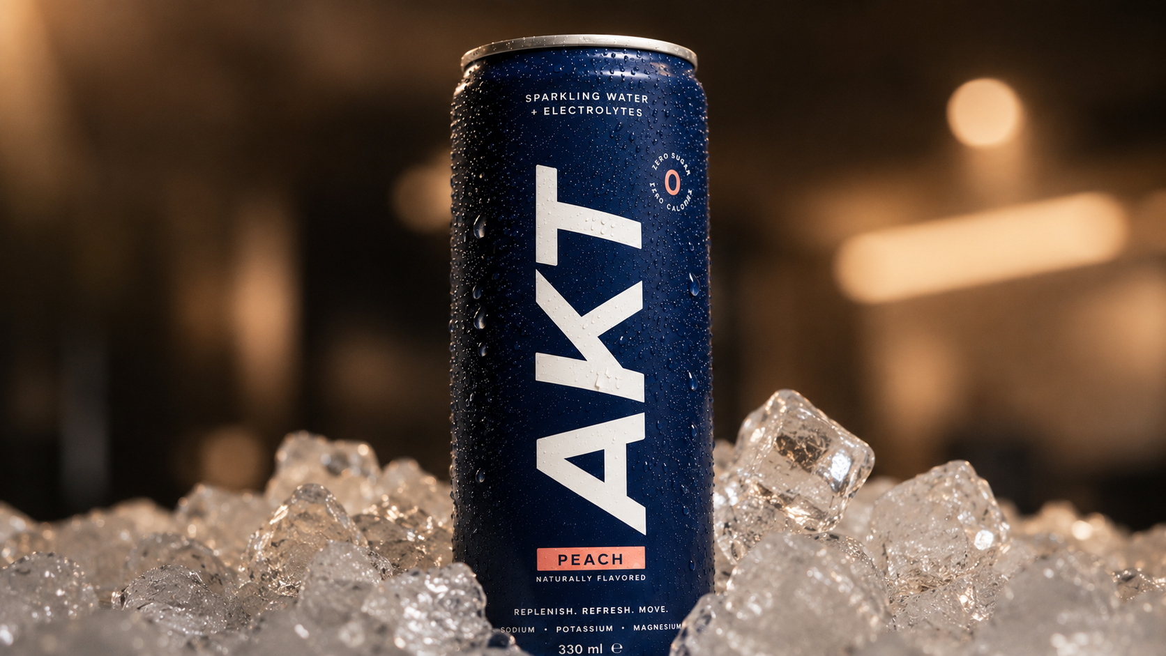 AKT sparkling water can on ice